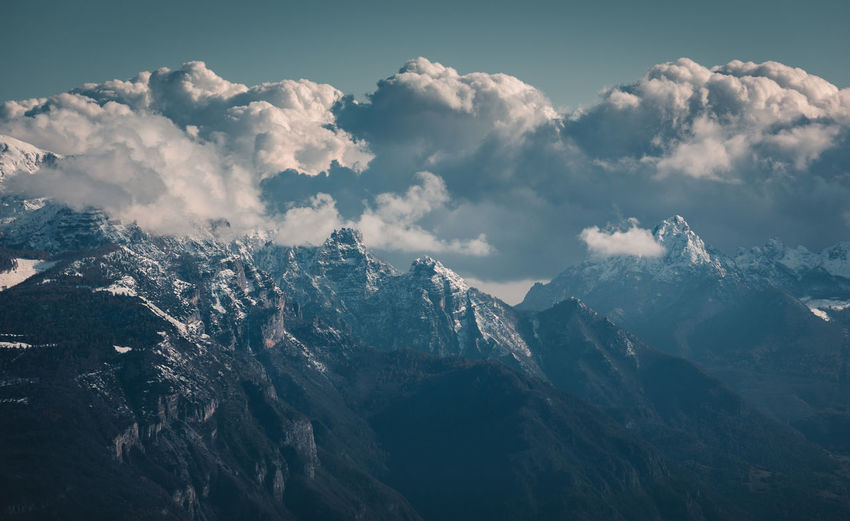 Scenic view of snowcapped mountains against sky