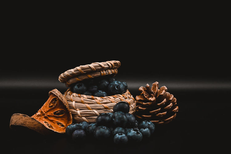 Close-up of pastries against black background