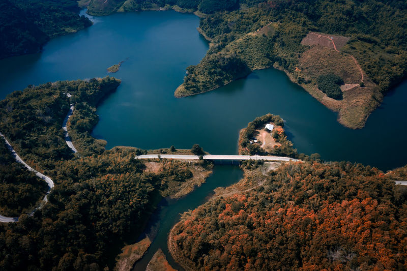 Landscape aerial view mae suai dam andthe route with bridges connecting the city in valley 