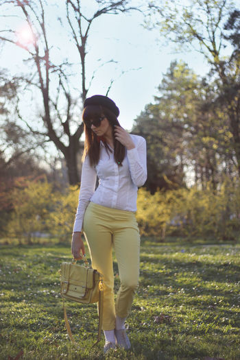 Full length of woman on field