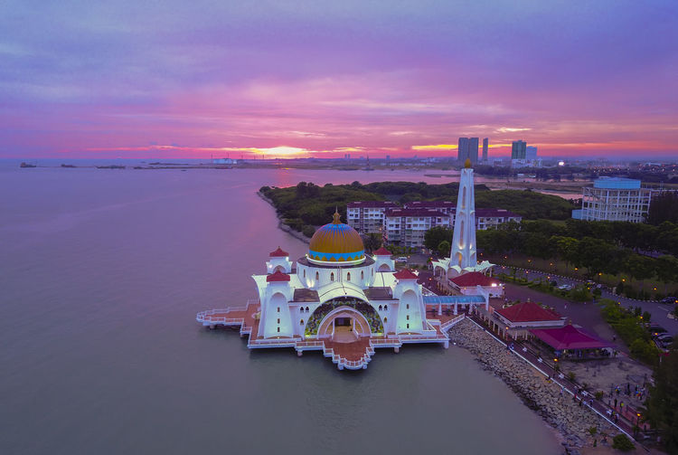 Aerial view of malacca straits mosque during sunset