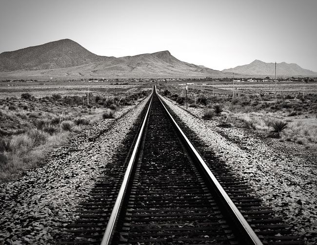 Railroad tracks on landscape