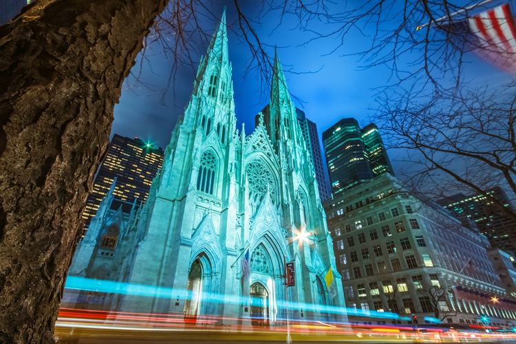 Low angle view of light trail by st patrick cathedral