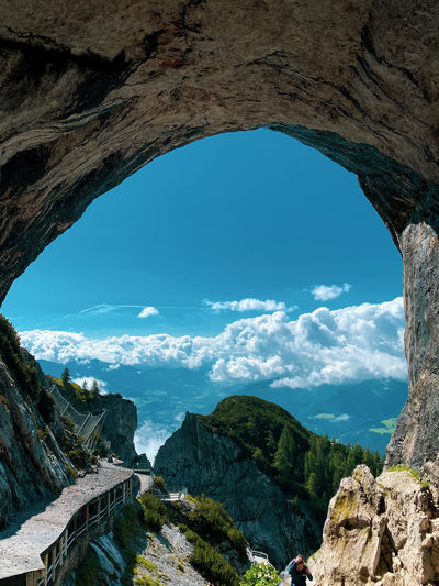 Scenic view of cave against sky
