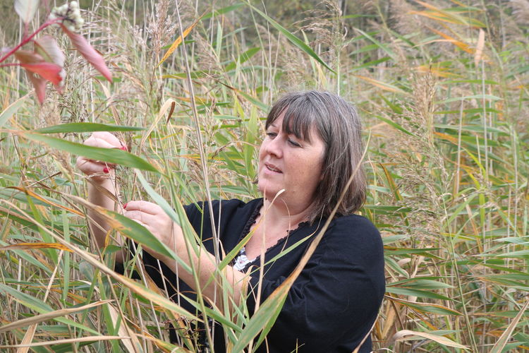 Woman looking at plants