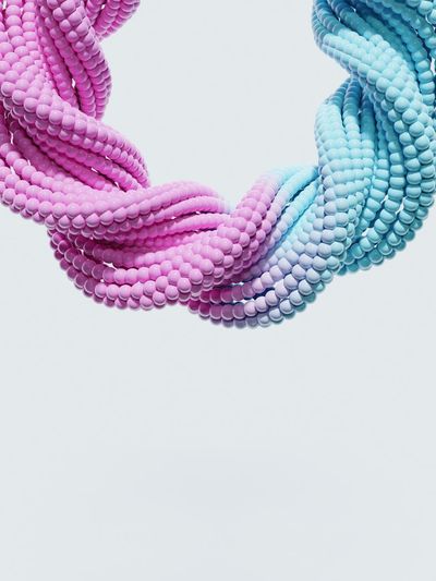 Close-up of rope tied over white background