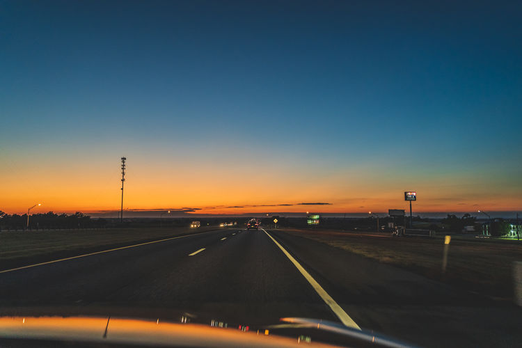 Highway seen through car windshield