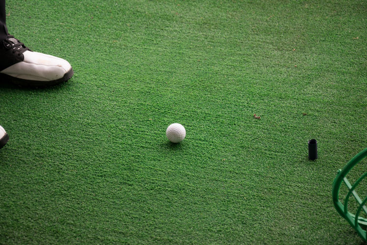 Low section of ball on grass