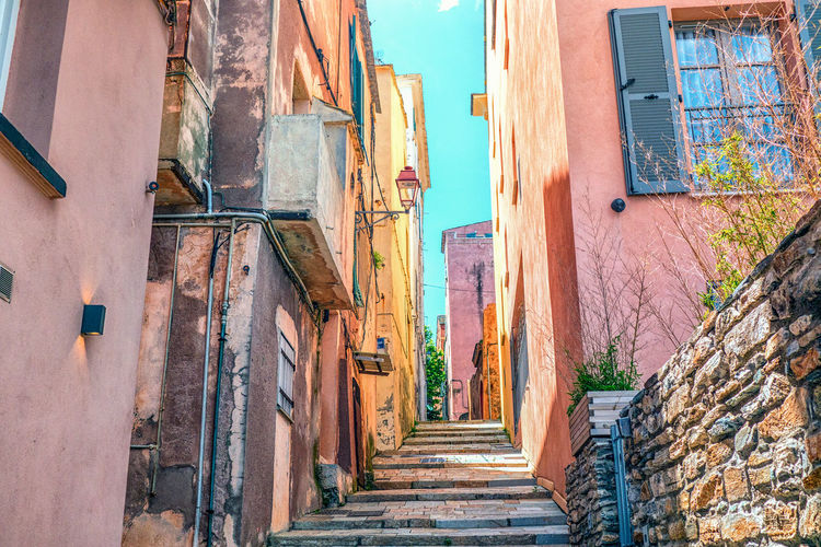 Narrow alley amidst buildings in city bastia france corsica 