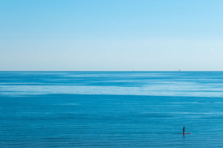 Minimal colorful landscape of sea and blue sky