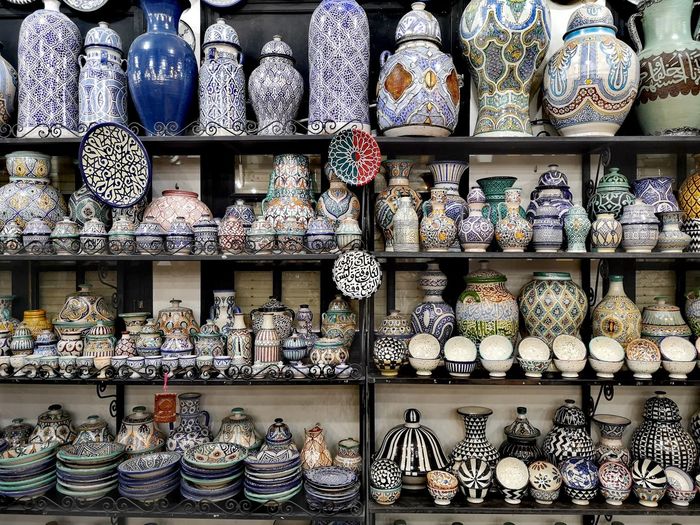 Ceramic crafts on shelf for sale in store