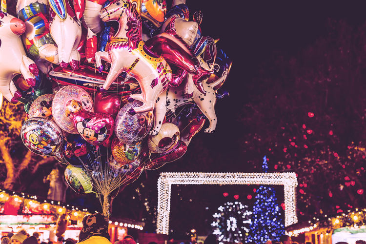 Illuminated christmas lights in amusement park