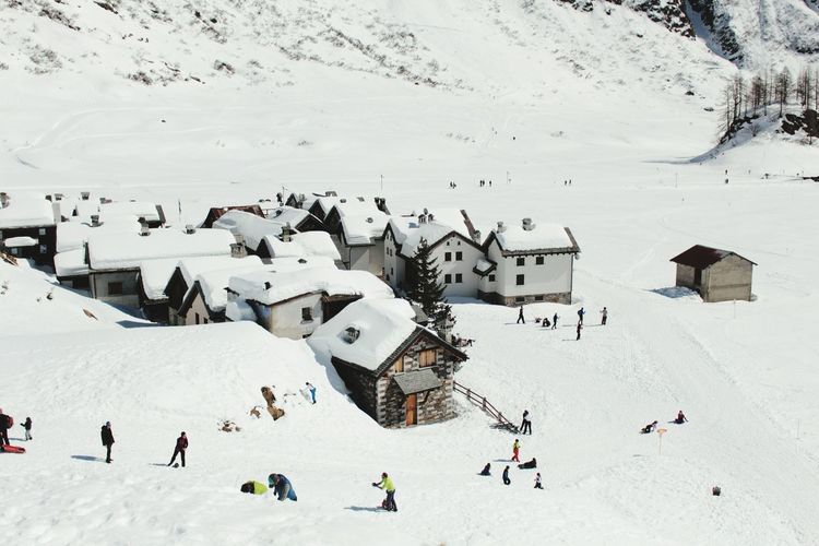 People on snow covered landscape