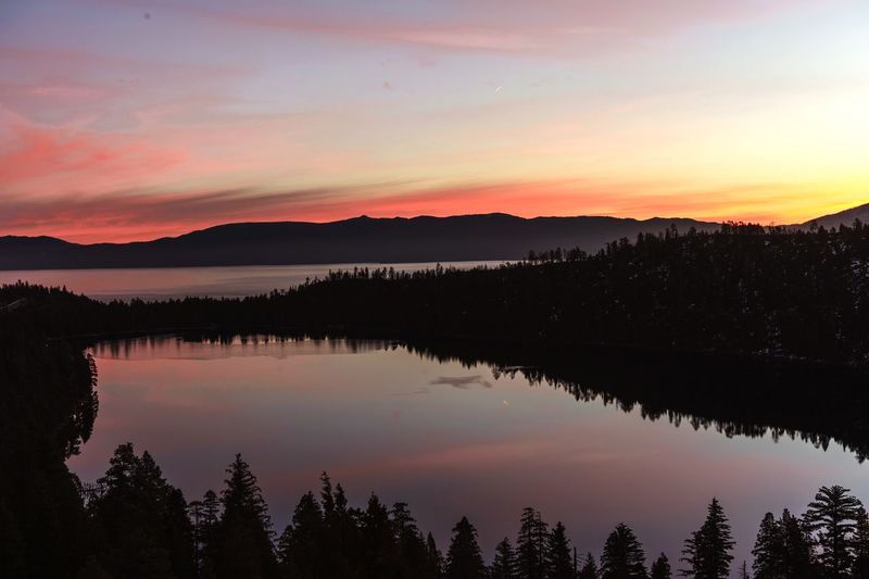 Scenic view of lake against sky during sunset