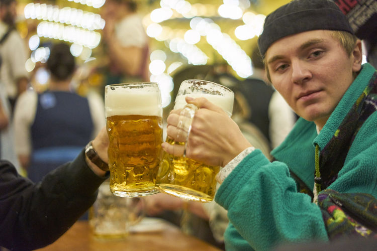 Portrait of man drinking beer