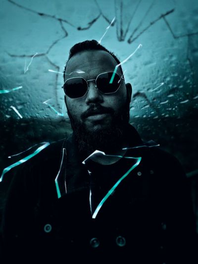 Portrait of young man wearing sunglasses