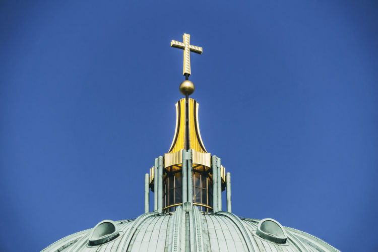 High section of church against clear blue sky