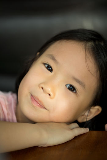 Close-up portrait of cute baby at home