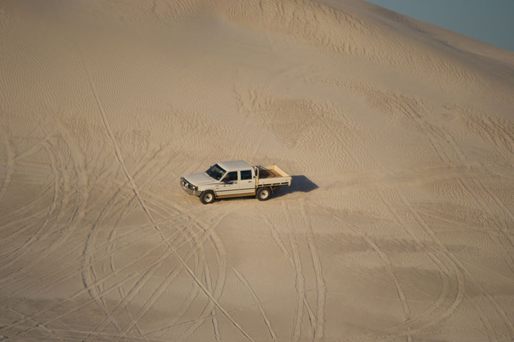 Car on desert land