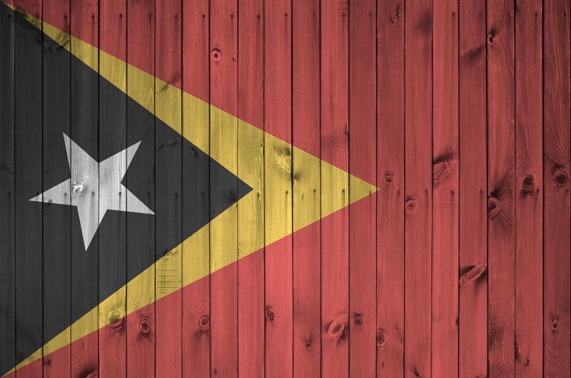Full frame shot flag on wooden wall