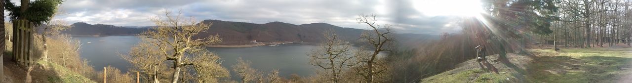 Panoramic shot of river against cloudy sky