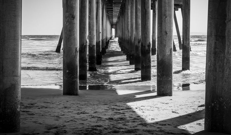 View of wooden pier on beach