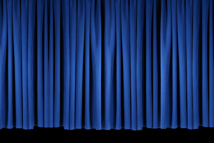 Blue backdrop on stage