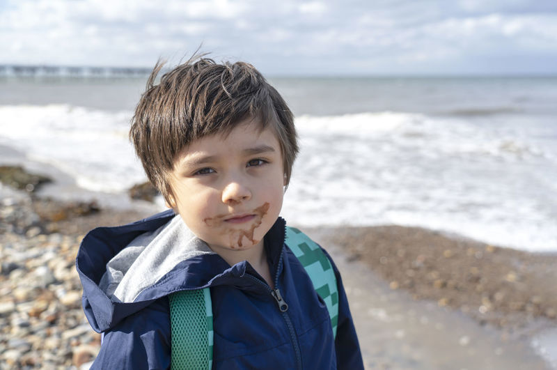 Portrait of cute boy on beach