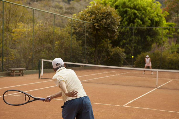 Man playing tennis