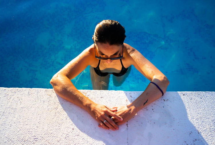 High angle view of woman in swimming pool