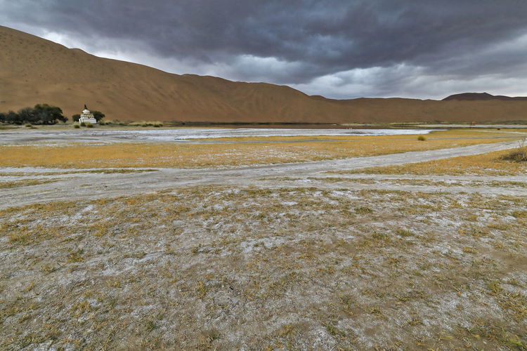 1105 sumu jaran lakebed among the badain jaran desert sand dunes. inner mongolia-china.