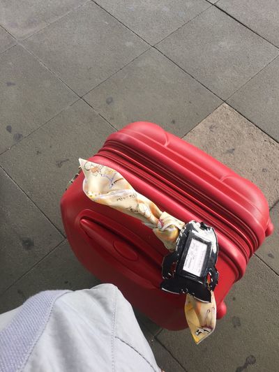 High angle view of luggage on footpath