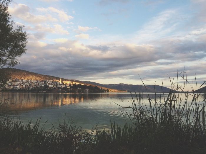 Countryside lake against built structures