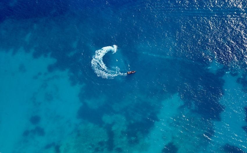 High angle view of jetski swimming in sea