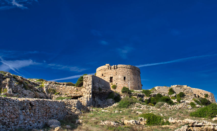 An ancient tower of a military structure near mahon, mao, spain, iberican island, cami de cavalls
