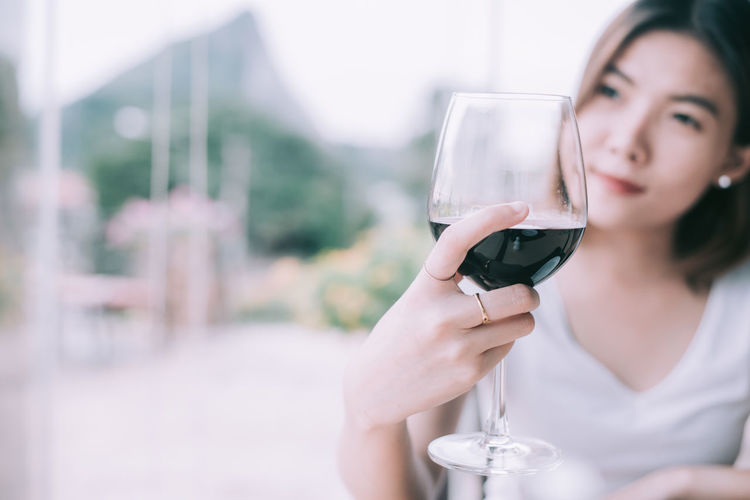Portrait of a woman drinking glass
