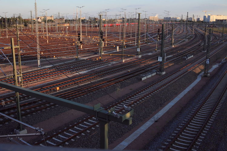 High angle view of railroad tracks in city against sky