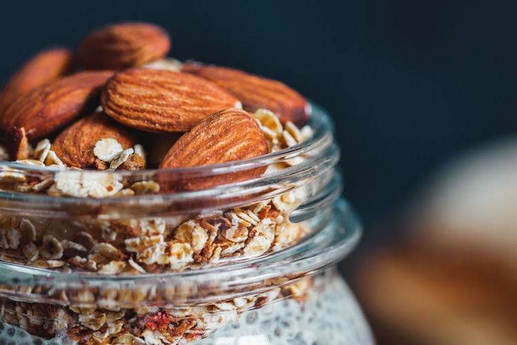Close-up of dried fruits in jar on table