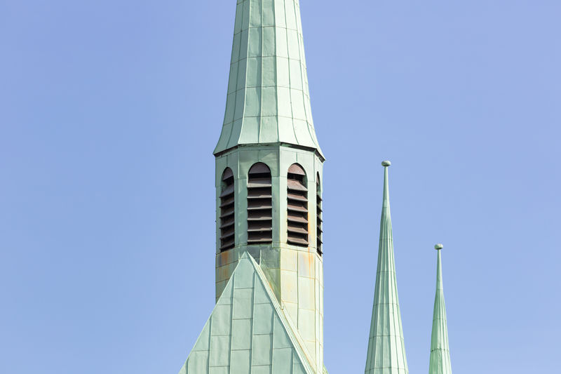 Church roof against clear blue sky