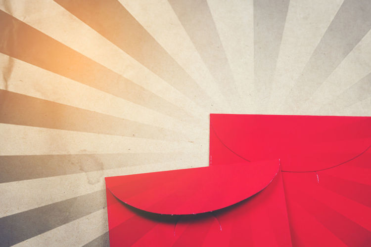 High angle view of red envelops on table