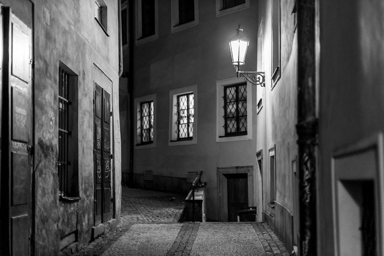 View of alley amidst buildings