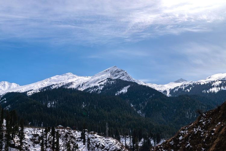 Beautiful himalayan mountains peak from tosh, a small village in himachal pradesh during winter