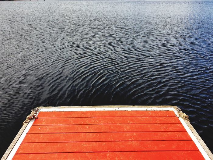 High angle view of pier against lake
