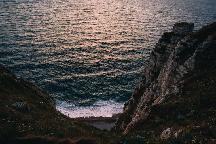 High angle view of rock formation at beach