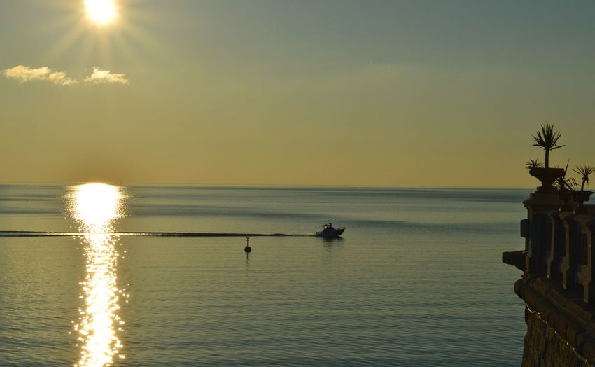 Scenic view of sea against sky during sunset
