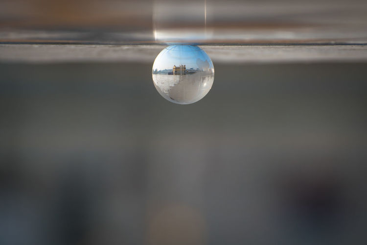 Close-up of crystal ball on field