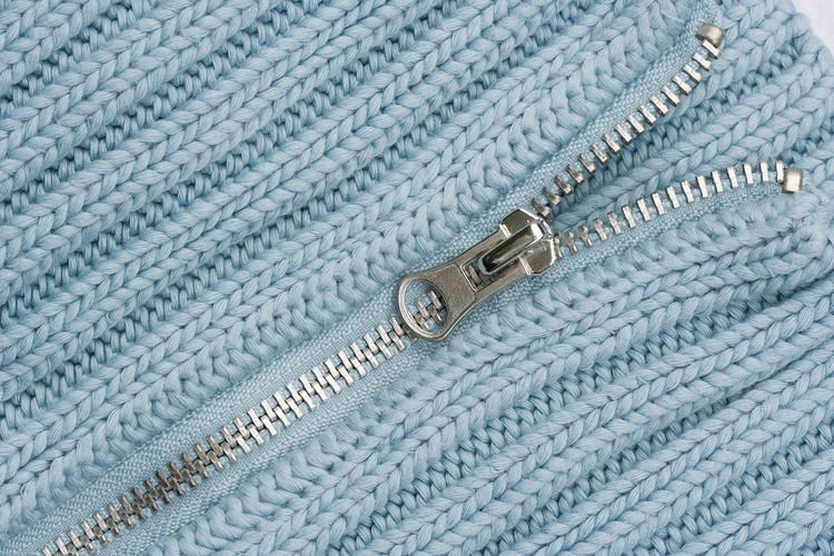 Close-up of sweater zipper