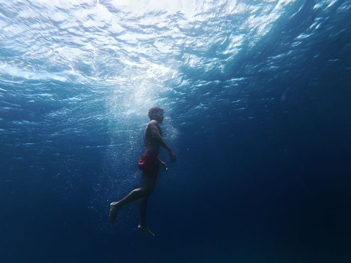 Man swimming in sea