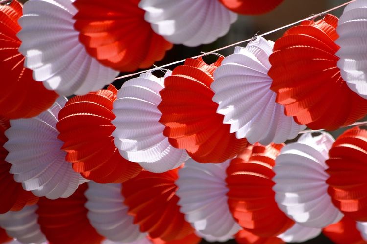 Close-up of rows of paper lanterns