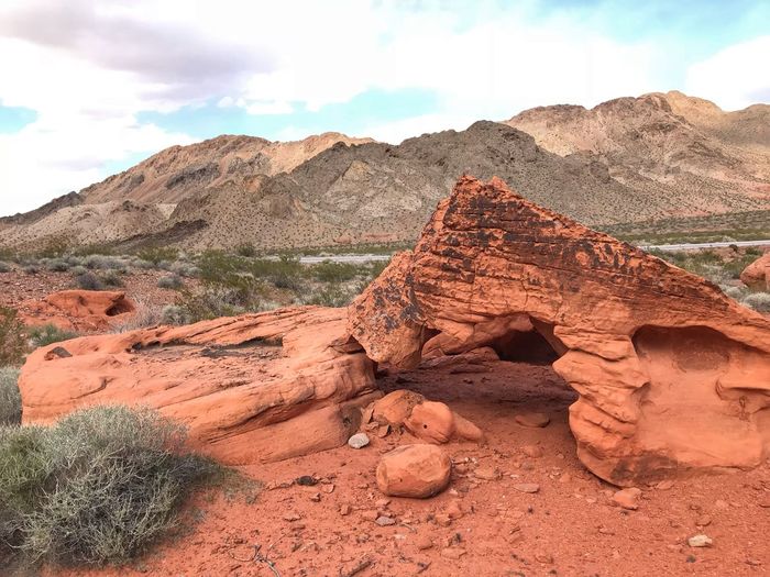 Rock formation in desert against sky